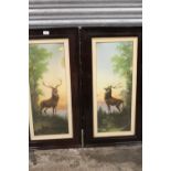 A PAIR OF VINTAGE FRAMED AND GLAZED PRINTS DEPICTING STAGS - 70 X 27 CM (2)