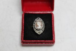 A 9CT & SILVER MARCASITE SET CAMEO RING