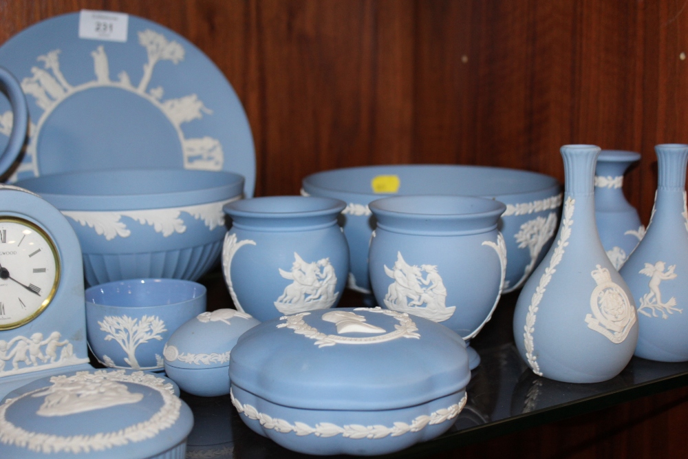 A LARGE QUANTITY OF BLUE WEDGWOOD JASPERWARE TO INCLUDE A TEAPOT, FRUIT BOWL, MANTEL CLOCK ETC. ( - Image 2 of 4