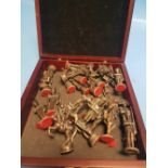 A CASED LEAD CHESS SET WITH ALL 32 PIECES IN THE FORM OF NAPOLEONIC FIGURES