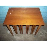 A RETRO TEAK NEST OF FIVE TABLES