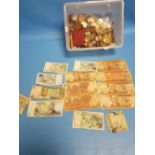 A BOX OF COINS AND BANKNOTES