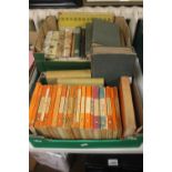 TWO TRAYS OF BOOKS TO INCLUDE ARTHUR RANSOME HARDBACK AND VINTAGE PENGUIN PAPERBACKS