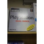 A BOXED SONY PLAYSTATION DUAL SHOCK