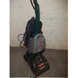 A BISSELL POWERWASH CARPET CLEANER