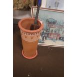 A TERRACOTTA PLANTER WITH DRIP TRAY AND VINTAGE CRICKET BAT