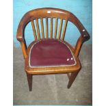 AN ANTIQUE OAK SMOKER'S BOW STYLE CHAIR