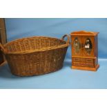 A WICKER LOG BASKET AND A JEWELLERY CABINET