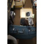 TWO SUITCASES TOGETHER WITH CONTENTS INCLUDING LEATHER AND FUR GLOVES, PURSES, HANDKERCHIEFS, HATS