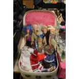 A SMALL CASE OF EARLY SINDY DOLLS AND SIMILAR WITH A QUANTITY OF CLOTHING