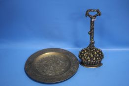 A BRASS FLOWER BASKET DOOR STOP AND ORIENTAL CHARGER (2)