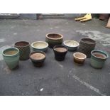 TEN LARGE CERAMIC PLANTERS, MOSTLY GREEN