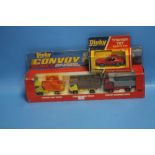 A BOXED VINTAGE DINKY CONVOY SET COMPRISING SKIP TRUCK, FARM TRUCK AND DUMPER TRUCK TOGETHER WITH