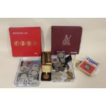 A COLLECTION OF VINTAGE AND ANTIQUE COINS TO INCLUDE COIN ALBUMS, COMMEMORATIVE COINS ETC.