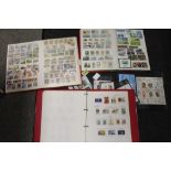 THREE STAMP ALBUMS AND CONTENTS