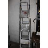 FOUR SETS OF STEP LADDERS