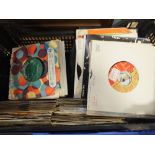 A BOX OF ASSORTED 7" SINGLE RECORDS