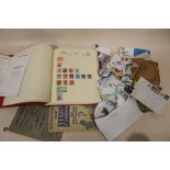 A COLLECTION OF VINTAGE STAMPS TO INCLUDE A STAMP ALBUM AND CONTENTS