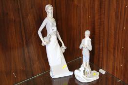 A LARGE NAO FIGURE OF A WOMAN HOLDING WATER JUGS H-40CM, TOGETHER WITH A LLADRO FIGURE OF A BOY WITH
