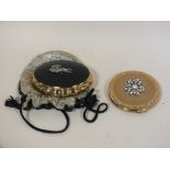 TWO VINTAGE LADIES POWDER COMPACTS TO INCLUDE A MUSICAL EXAMPLE