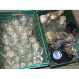 TWO TRAYS OF ASSORTED GLASSWARE, to include decanters, Bristol blue glass, boxed set of vintage cars