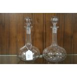 A PAIR OF ANTIQUE GLOBE AND SHAFT STAR CUT DECANTERS, with original hollow blown engraved stoppers