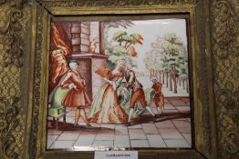A GILT FRAMED HAND PAINTED PORCELAIN PLAQUE DEPICTING FIGURES IN CLASSICAL DRESS AT AN ENTRANCE