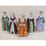 FIVE CERAMIC FIGURES OF THE WIVES OF KING HENRY VIII, COMPRISING ANNE BOLEYN, ANN OF CLEVES,