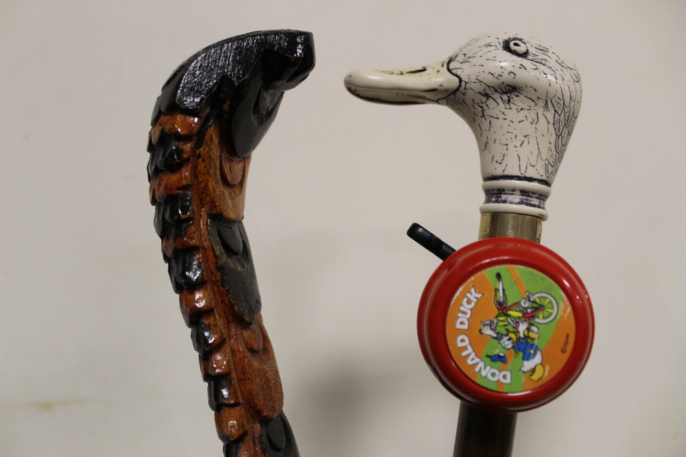 A COLLECTION OF VINTAGE AND MODERN WALKING STICKS TO INCLUDE A CARVED COBRA STYLE EXAMPLE, - Image 2 of 2