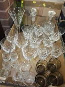 A TRAY OF CUT GLASS TO INCLUDE DECANTERS