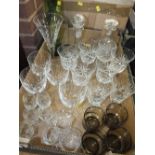 A TRAY OF CUT GLASS TO INCLUDE DECANTERS