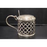 AN ANTIQUE SILVER MUSTARD POT - BIRMINGHAM 1931