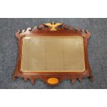 A 20TH CENTURY GEORGIAN STYLE MAHOGANY WALL MIRROR, having bevelled glass plate, gilt painted