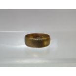 A 9CT GOLD HALLMARKED WEDDING BAND, ring size R, together with a 9ct gold signet ring and another