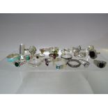 A COLLECTION OF MAINLY SILVER DRESS RINGS, varying styles, sizes and marks, to include gemset and