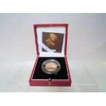 A 2005 GOLD PROOF FIFTY PENCE COIN, celebrating the 25th anniversary of Samuel Johnson`s dictionary,