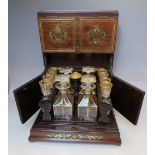 A VICTORIAN ROSEWOOD INLAID TABLE TOP DRINKS CABINET, the cabinet with inlaid brass detail and