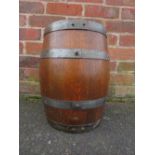 A SMALL OAK BANDED BARREL, H 38 cm