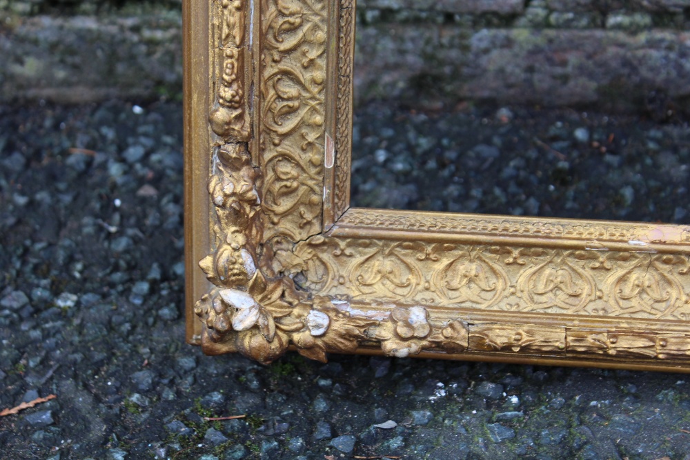 A 19TH CENTURY DECORATIVE GOLD FRAME WITH SOME RESTORATION, frame W 6 cm, rebate 51 x 34 cm - Image 5 of 6