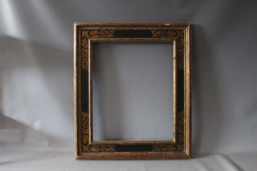 A 19TH CENTURY GOLD FRAME WITH INNER GOLD DECORATIVE SCROLLWORK, frame W 10 cm, rebate 57 x 47 cm