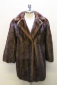A LADIES VINTAGE RICH MAHOGANY BROWN FUR COAT, fully lined, hook fastening, side pocketsCondition