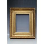 A 19TH CENTURY GOLD FRAME WITH ACANTHUS LEAF DESIGN TO OUTER EDGE, frame W 11 cm, rebate 37 x 28 cm