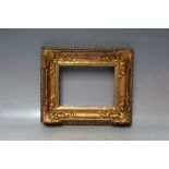 A LATE 18TH / EARLY 19TH CENTURY DECORATIVE GOLD FRAME, with corner embellishments, frame W 6 cm,