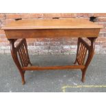 A VICTORIAN MAHOGANY FOLDING CAMPAIGN TRAVELLING DESK, having two frieze drawers, the lyre shaped