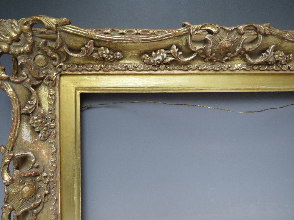 A 19TH CENTURY PIERCED AND SWEPT GOLD FRAME WITH GOLD SLIP, frame W 8 cm, slip rebate 314 x 48.5 cm, - Image 5 of 6