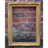 A 19TH CENTURY DECORATIVE GOLD FRAME WITH SOME RESTORATION, frame W 6 cm, rebate 51 x 34 cm