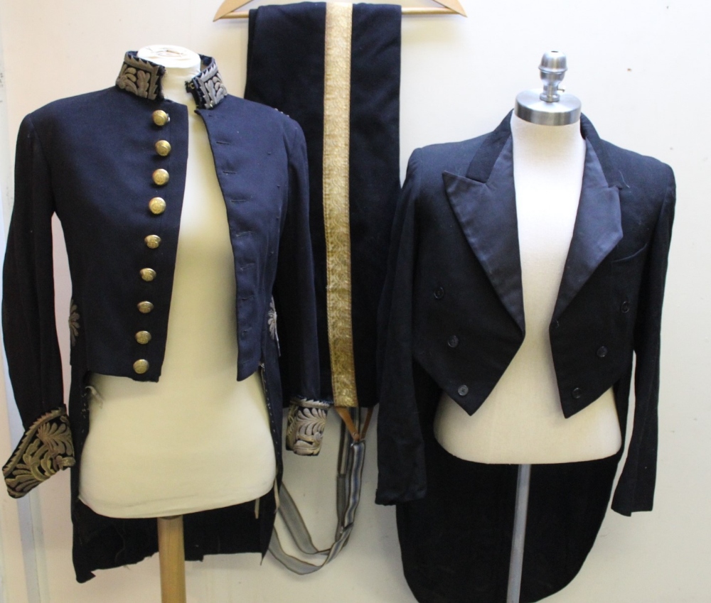 A VINTAGE TWO PIECE DRESS UNIFORM, comprising tail coat and trousers, the tail coat with profuse