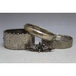 TWO VINTAGE HALLMARKED SILVER BANGLES, together with a silver herringbone bracelet stamped Italy 925