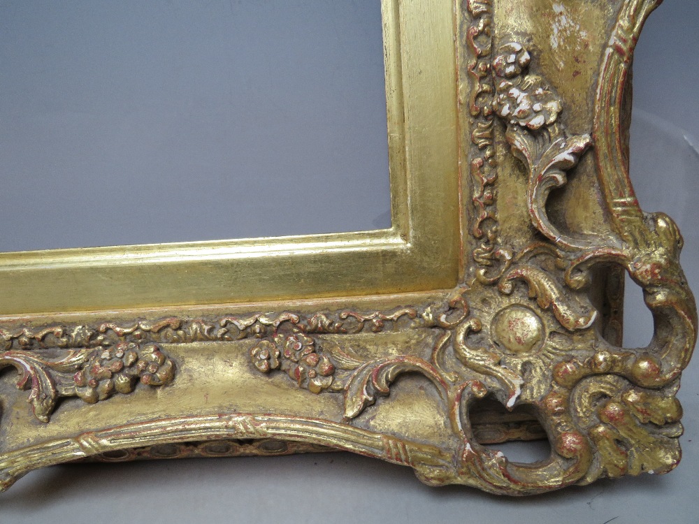 A 19TH CENTURY PIERCED AND SWEPT GOLD FRAME WITH GOLD SLIP, frame W 8 cm, slip rebate 314 x 48.5 cm, - Image 3 of 6