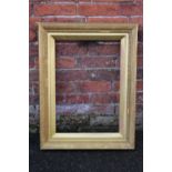 A 19TH CENTURY GOLD FRAME WITH REEDED DECORATION AND GOLD SLIP, needs some restoration, frame W 5
